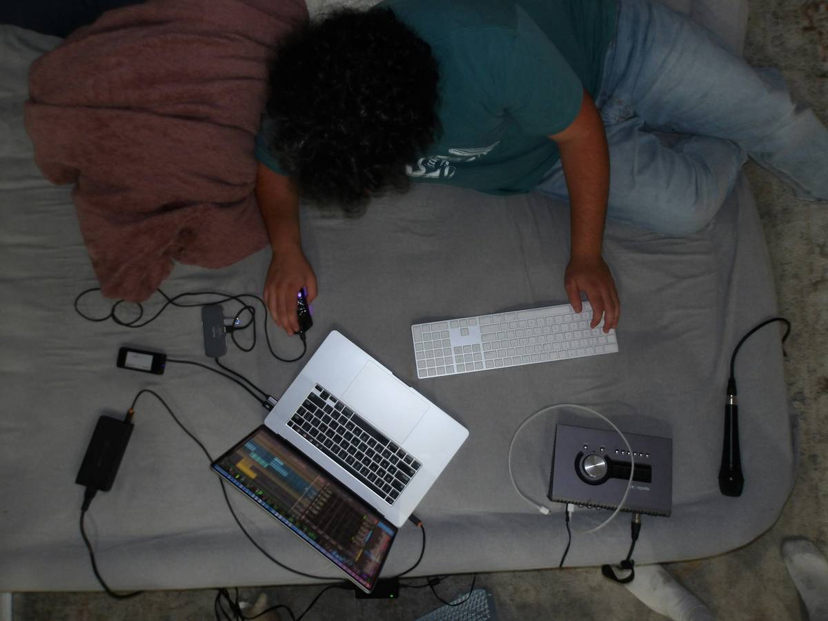 Modern gaming room ideas with bed featuring lofted bed over L-shaped desk setup